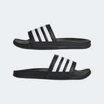 Black slides with white stripes on a light gray background